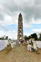 Manaca Iznaga, Cuba - Jan 12, 2017 -  Historic slave watch tower in Manaca Iznaga, Valle de los Ingenios, Trinidad, Cuba. It is the tallest lookout tower ever built in the Caribbean sugar region. photo