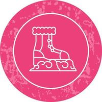 icono de vector de botas de nieve