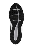 The polyurethane sole of the shoe is black with white stripes. photo