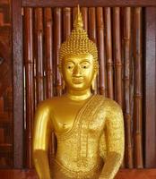 Makha Asanaha Visakha Bucha Day Golden Buddha image photo