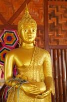 Makha Asanaha Visakha Bucha Day Golden Buddha image photo