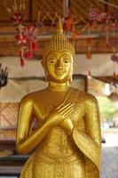 Makha Asanaha Visakha Bucha Day Golden Buddha image photo