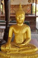 Makha Asanaha Visakha Bucha Day Golden Buddha image photo