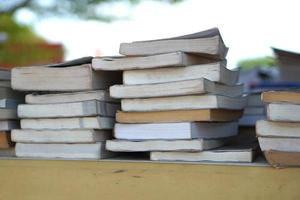 Stacks of old books waiting to be recycled. photo