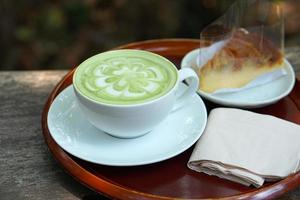 Fresh green tea in a glass photo