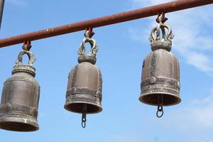 bells in the sky background temple photo