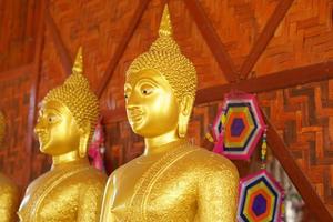 Makha Asanaha Visakha Bucha Day Golden Buddha image photo