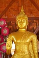 Makha Asanaha Visakha Bucha Day Golden Buddha image photo