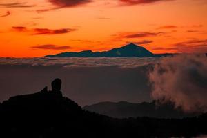 Spectacular sunset above the clouds of the Teide volcano national park on Tenerife. photo