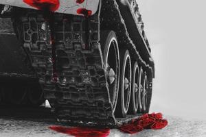 tank wheels with blood on them photo