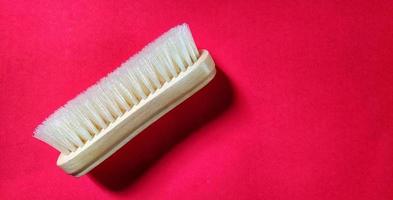 Top view of white clothes brush photo