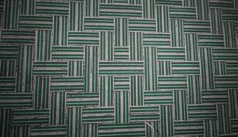 Plastic woven background that forms a pattern photo