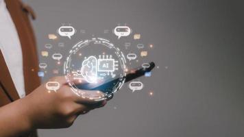 Businesswoman using chatbot in computer smart intelligence Ai. Chat GPT Chat with AI Artificial Intelligence, developed by OpenAI generate. Futuristic technology, robot in online system. photo