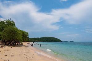 Beautiful Landscape viewpoint for design postcard and calendar  tropical rock beach front view sea blue sky overlooking Nang Ram Beach Sattahip Bay Chonburi Thailand On clear day white cloud holiday photo