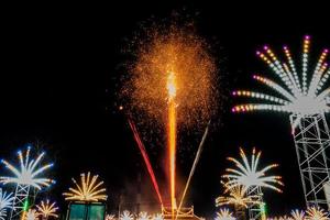 fireworks over the temple in the dark sky photo