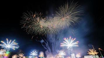 fireworks over the temple in the dark sky photo