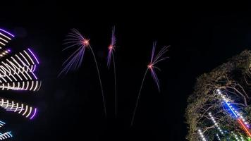 fireworks over the temple in the dark sky photo