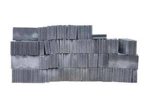 Stack of concrete blocks in construction site isolated on white background included clipping path. photo
