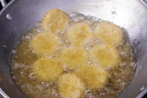 frying pan with fried chicken nugget photo