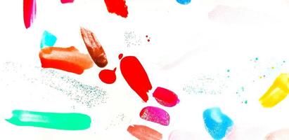 Colorful of nail polish painted or be stained isolated on white background or pad paper. Art and Abstract of color. photo