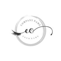 initial EO logo handwriting beauty salon fashion modern luxury monogram vector