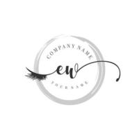 initial EW logo handwriting beauty salon fashion modern luxury monogram vector