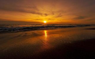 Beautiful empty beach landscape with dramatic sky photo