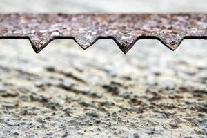 The sharpness of saw blade is old and rusty photo