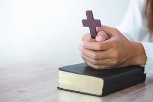 Religious young woman praying to God in the morning, spirtuality and religion, Religious concepts photo