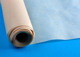 rolled brown parchment paper roll for baking photo