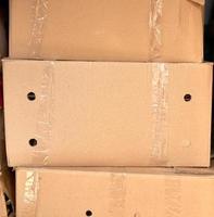 stack of brown cardboard boxes photo