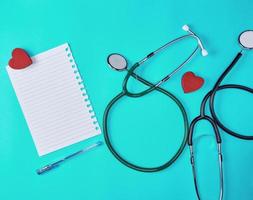 blank white piece of paper in a line and a medical stethoscope photo