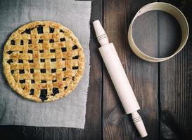 round baked fruit cake on a gray napkin photo