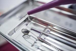 Close up view of different dental tools in clinic photo