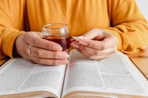 Coloured Christian Women Practicing Her Faith photo