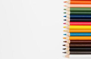 Multi color pencils. the concept of a multinational family and equality in the world. photo