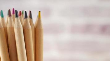 Close up of colorful pencils on color background video