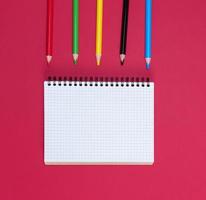 open notebook with empty white sheets photo