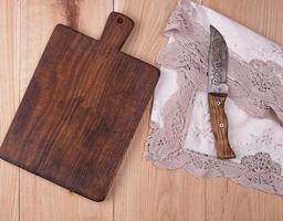 Empty old wooden kitchen cutting board photo