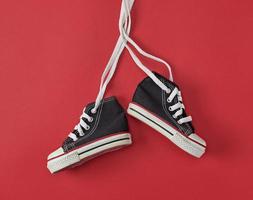 pair of black old textile sneakers photo