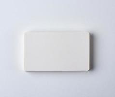 stack of blank rectangular paper white business cards photo