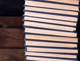 large stack of books in a blue cover photo