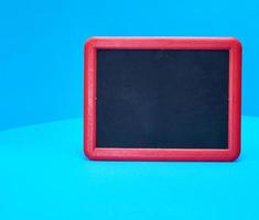 empty chalk board in red frame photo