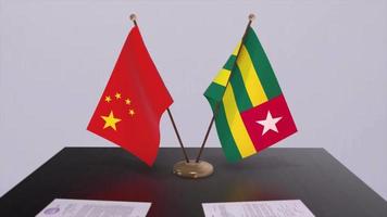 fundo 3d da bandeira de togo e china. ilustração de política. negócio, animação de acordo. papel de assinatura video