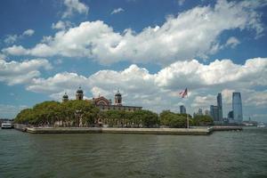 ellis island new york view cityscape from hudson river liberty island photo