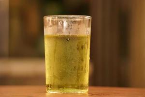 fresh glass of cider in a new york state winery bar detail photo