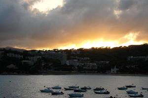 Clouds and light effects in the sky at dawn or dusk. photo