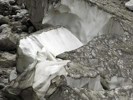 The view of workers cover Marmolada glacier during summer time preventing ice melting, Trentino-Alto Adige, Italy. photo