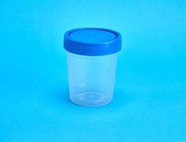 empty plastic jar for medical tests photo