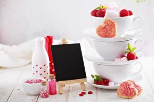 Valentines day sugar cookies in stacked cups photo